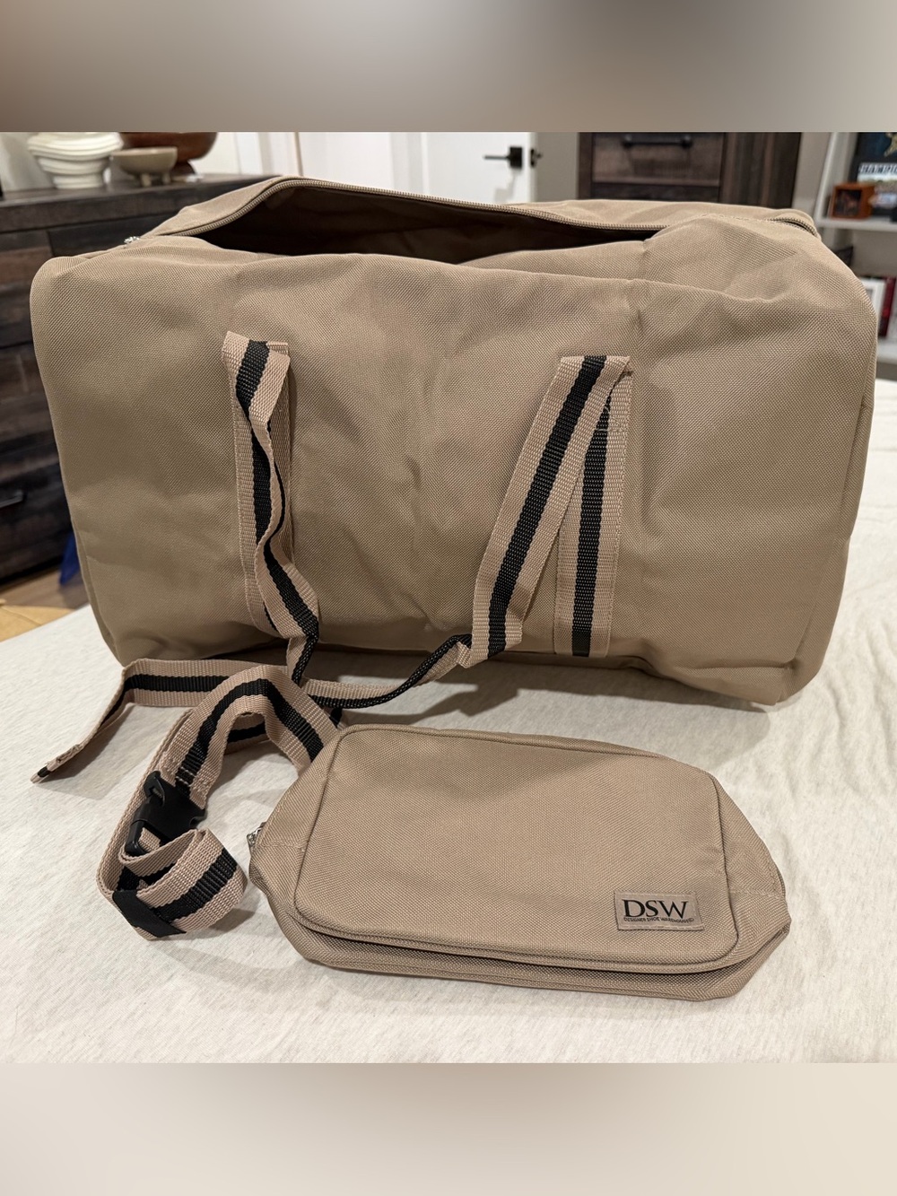 DSW Tan Canvas Duffel Bag with Striped Shoulder Strap and Matching Pouch